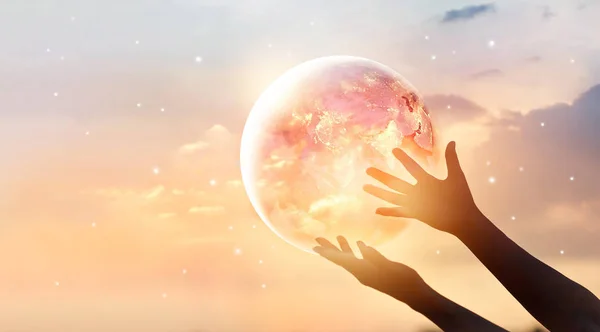 Save the world energy campaign. Planet earth on human hands — Stock Photo, Image