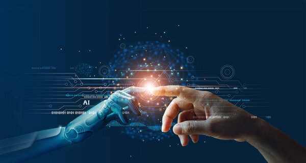 AI, Machine learning, Hands of robot and human touching on big data network connection. Royalty Free Stock Images