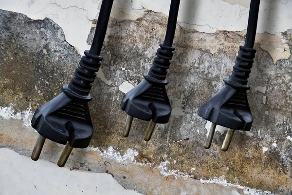 Tres enchufes eléctricos — Foto de Stock