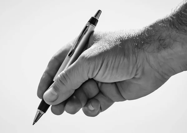 Pen in de hand — Stockfoto