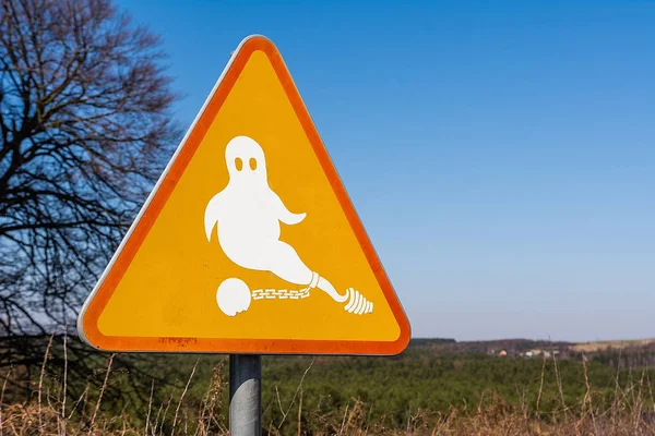 Ghost on the sign near the castle in Bobolice (Poland)