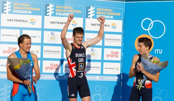 Stockholm - 26 Ağustos 2017: Jonathan Brownlee, Kristian Blummenfelt ve Pierre le Corre kazananın stand erkekler İTÜ dünya triatlon serisi olay Augist 26, 2017 Stokholm, İsveç
