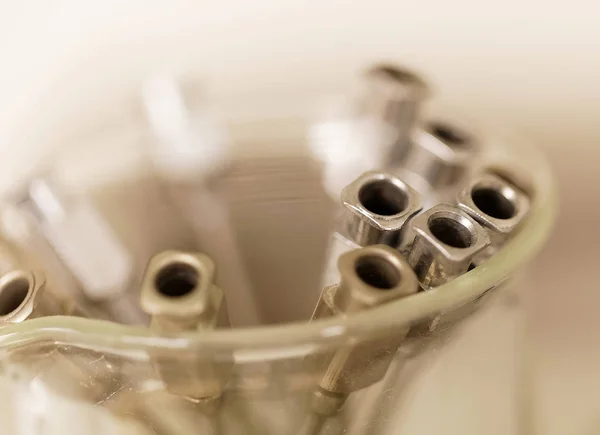 Closeup of silver color hypodermic or syringe used in the lab. V — Stock Photo, Image