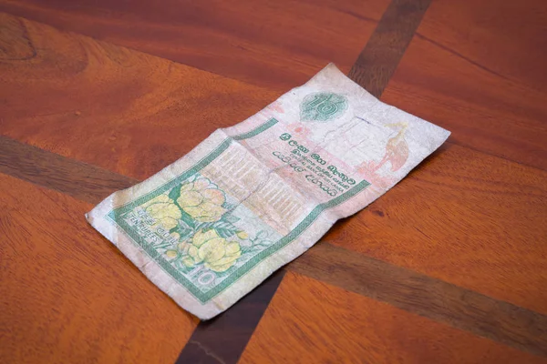 Ten rupees on the table. — Stock Photo, Image