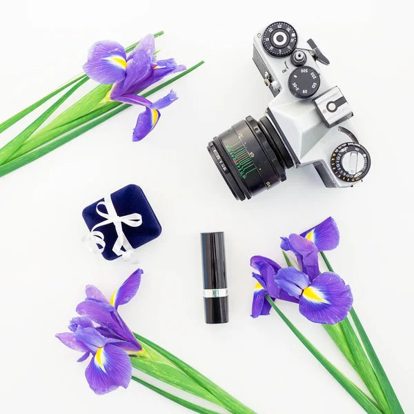 flowers with vintage camera and lipstick