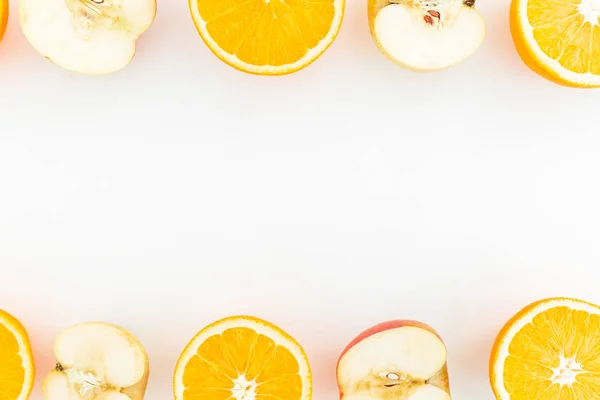 Orange and apple slices on white — Stock Photo, Image