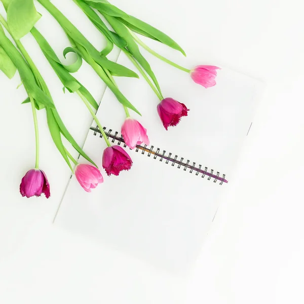 tulip flowers and notepad