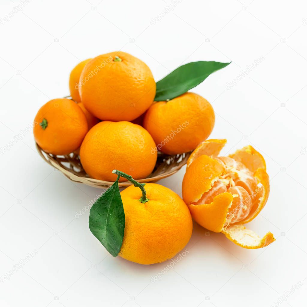 heap of oranges in wicker bowl