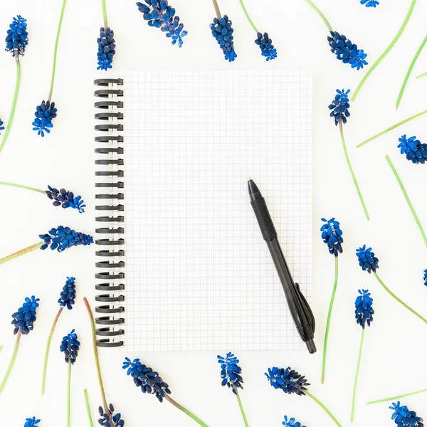 flowers  with notebook and pen