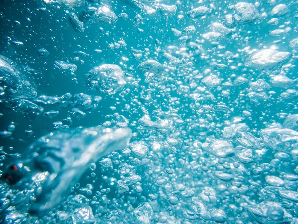 Bubbles underwater in sea