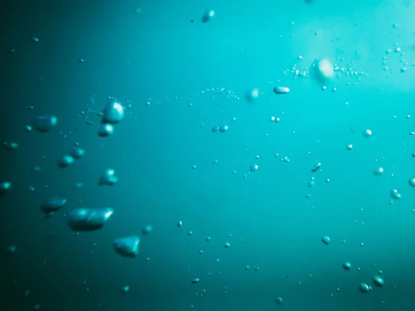Bubbles underwater in sea