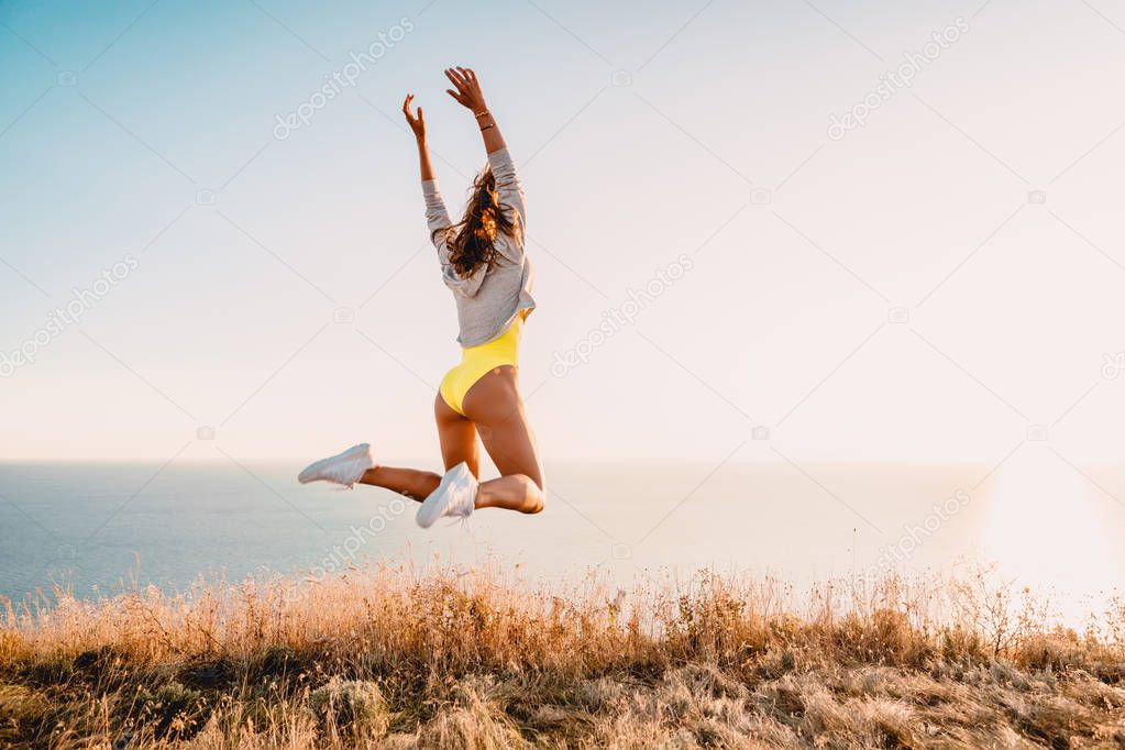 Happy woman jumping 