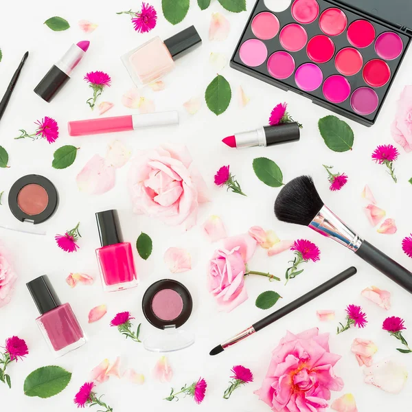 desk with cosmetics on white background. Flat lay, top view.