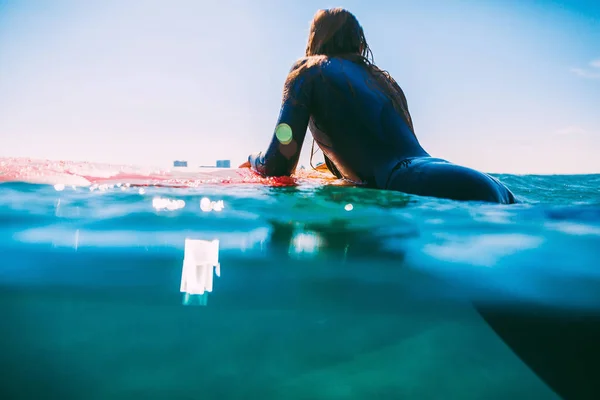 Young sexy woman  on surf board — Stock Photo, Image