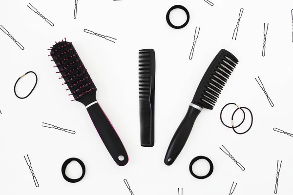 Tools for the hairdresser on white background. Beauty composition. Flat lay, top view
