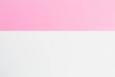 Beyaz ve pembe pastel arka plan. Düz yatıyordu. Üstten Görünüm