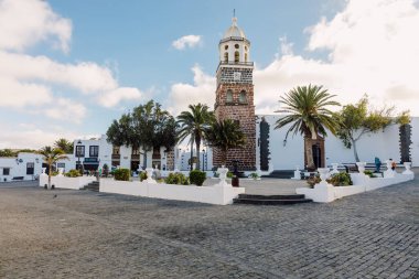 Teguise, Lanzarote, Spain - April 04, 2020. The old architecture of city of Teguise. Church Iglesia de Nuestra Senora de Guadalupe clipart