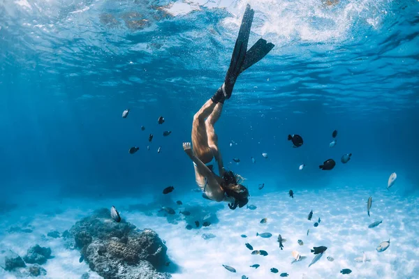 Free Diver Girl Fins Glides Sandy Bottom Tropical Fishes Blue — Stock Photo, Image