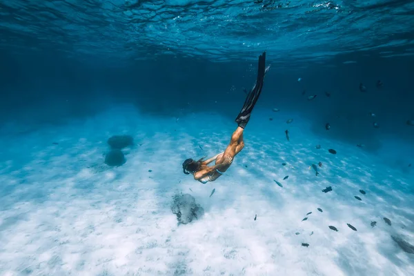 Freediver Girl Bikini Fins Glides Underwater Blue Transparent Ocean — Stock Photo, Image