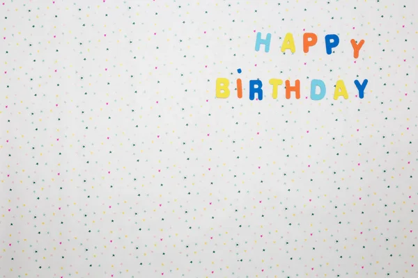 Colorful happy birthday wishes with stars on white background , space for text — Stock Photo, Image