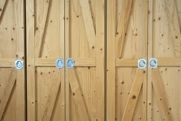 Modern wooden brown doors closeup storage, retro modern interior background texture — Stock Photo, Image
