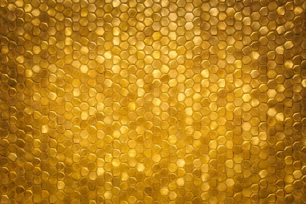 Gold sparkling little tiled wall background texture, modern luxury rich shiny mosaic pattern