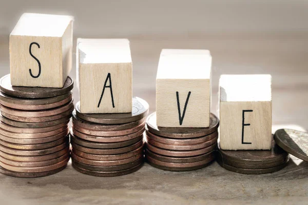 Stack of coins with save letter in wooden block, Time to Saving Concept growing money stairs — Stock Photo, Image