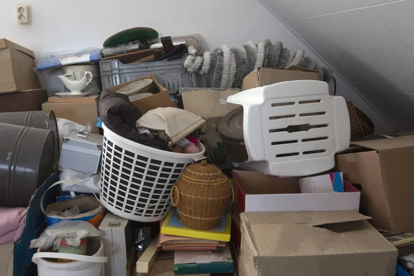 Pile of junk in a house, hoarder room pile of household equipment needs clearing out — Stock Photo, Image