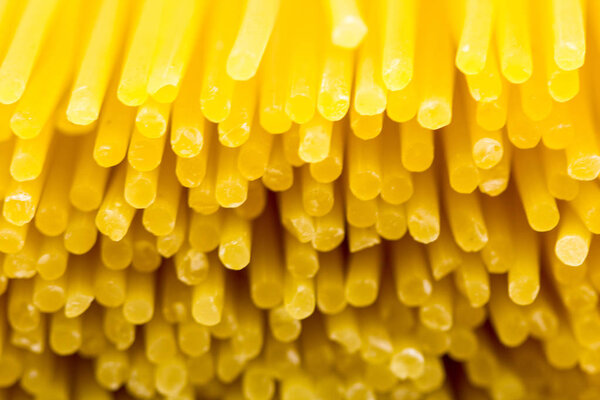 Yellow pasta close up macro.
