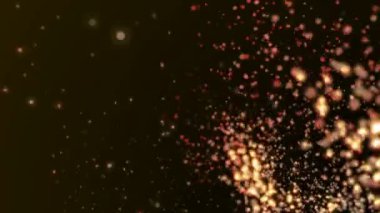 Koyu arka plan üzerinde uçan altın parıldıyor.