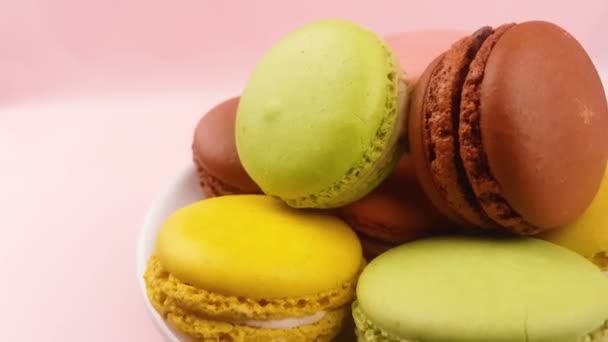 Sweet Color Macaroons Macaron Rotated White Plate Pastel Pink Surface — Stock Video