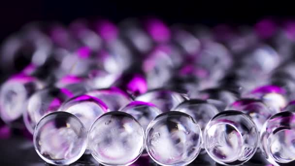 Фіолетові Фіолетові Водяні Гелеві Кульки Макрозйомка Може Бути Використана Реклами — стокове відео