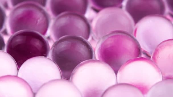 紫罗兰和紫色的水凝胶球 宏观镜头 可用于广告或化妆品和药品 抽象背景 — 图库视频影像
