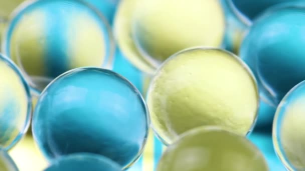 Blauwe Gele Water Gel Ballen Kan Worden Gebruikt Voor Reclame — Stockvideo
