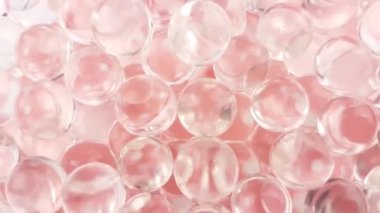 Pembe pastel su jel topları. Reklam veya kozmetik ve ilaç için kullanılabilir. Sorunsuz döngü.
