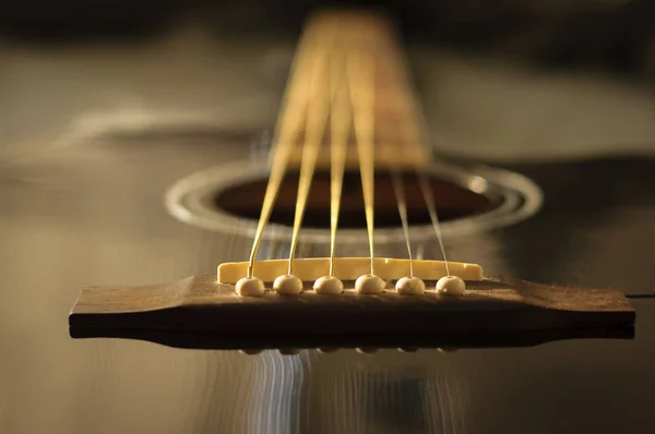 Black acoustic guitar — Stock Photo, Image