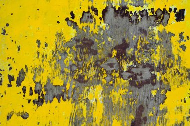 Soyulmuş boyanın dokusu mavi-sarıdır.