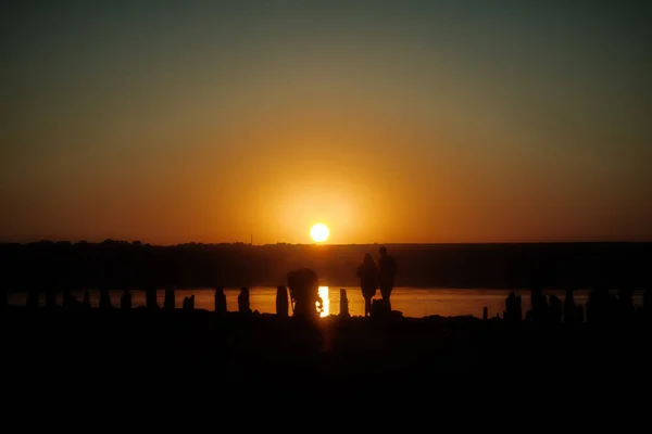 Zonsondergang over water — Stockfoto