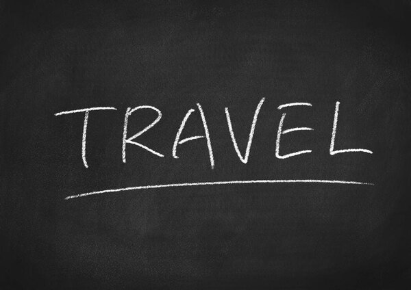 Travel concept word on a chalkboard background