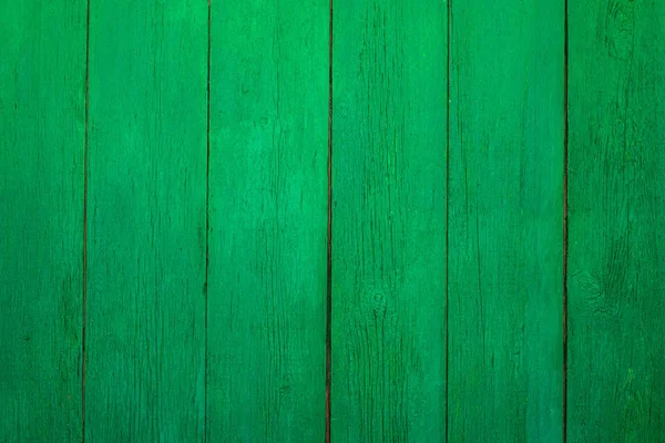 Wooden texture of an old fence painted green — Stock Photo, Image