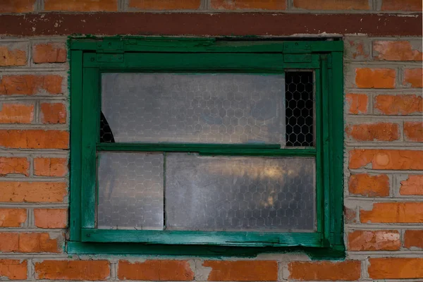 Old barn with a vintage wooden window — Stock Photo, Image