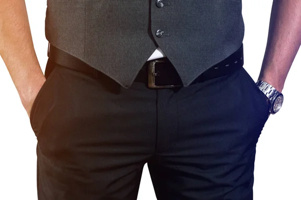 En ung affärsman håller händerna i fickorna på sin trouse — Stockfoto