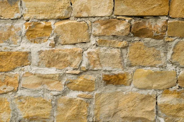 Tekstura kamiennego muru. Może służyć jako tło dla projektu — Zdjęcie stockowe