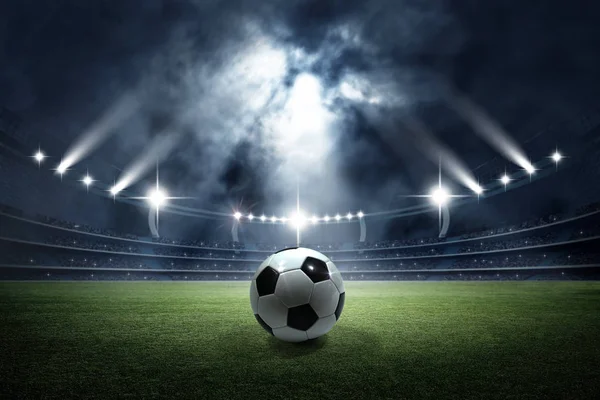 Soccer ball in the stadium — Stock Photo, Image