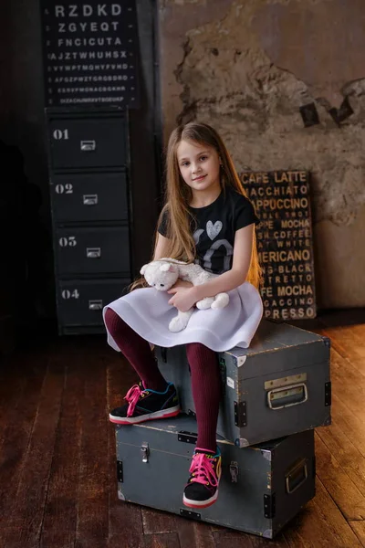 Little girl in loft studio — Stock Photo, Image