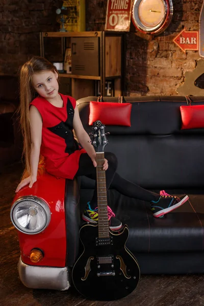 Little girl in loft studio — Stock Photo, Image