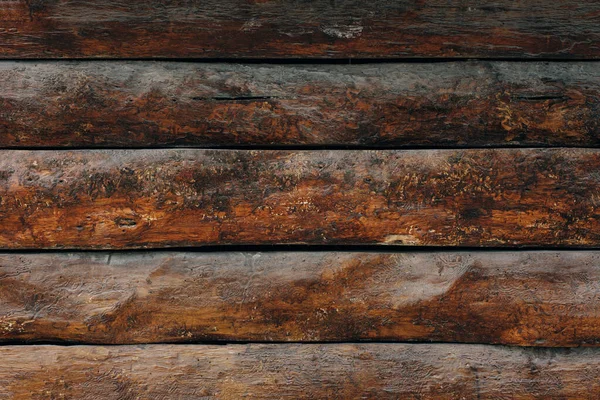 Dark wooden fence. Shabby table, dirty pine lumber. Old wood boards. — Stock Photo, Image