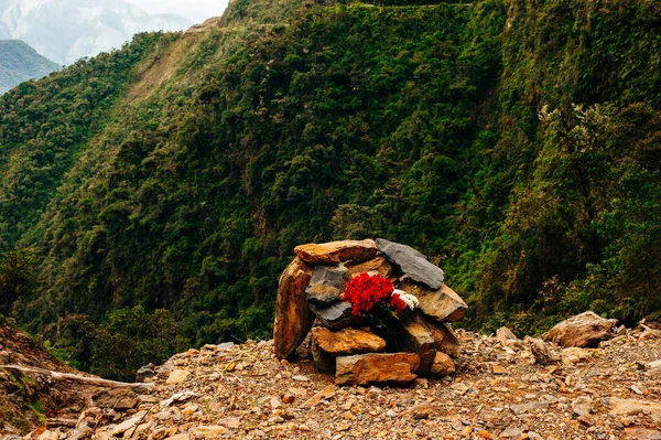 The graves of the dead people participants descent at The Worlds Most Dangerous Death road in Bolivia.