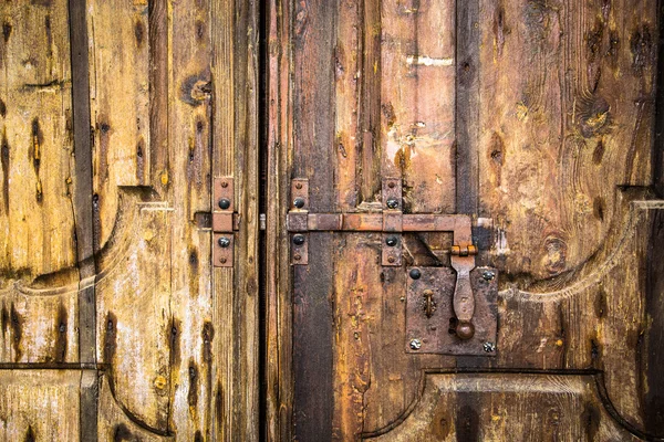 Deadbolt on wooden door. — Stock Photo, Image