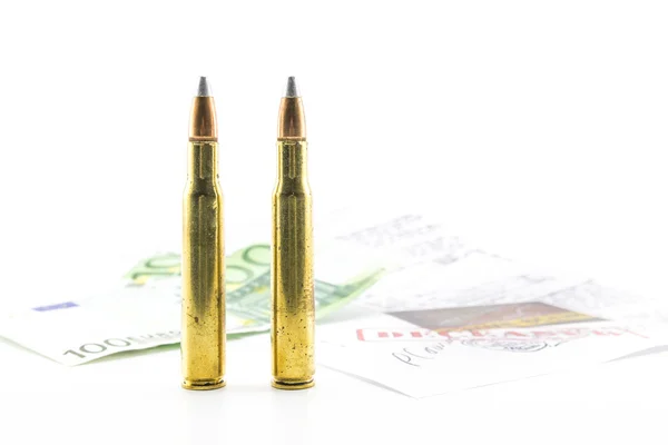 Bullets, money and documents of the investigation — Stock Photo, Image